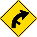 (PW-26) Curve between 15 and 90 degrees with minor road, to right