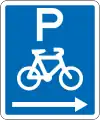 (R6-52.1) Cyclists Parking (on the right of this sign)