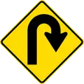 (W12-1.4/PW-19) Dangerous curve greater than 120 degrees, to right