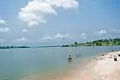 Swimming activity and buckets at Oguta Lake.