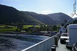 View of the ferry quay at Ytre Oppedal seen from the ferry MF Svanøy on the Lavik-Oppedal route