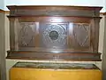 A highly carved mantelpiece in Gateside Memorial Hall.