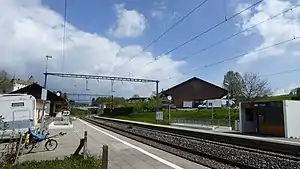 Double-track railway line with side platforms