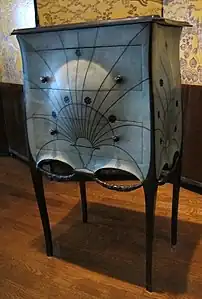 Rococo influences – Commode, by Paul Iribarne Garay (c. 1912), mahogany and tulip wood frame, slate top, green-tinted shagreen upholstery, ebony knobs, base and garlands, Museum of Decorative Arts, Paris