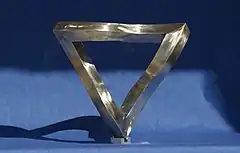 Real Penrose Triangle, Stainless Steel, by W.A.Stanggaßinger, Wasserburg am Inn, Germany. This type of impossible triangle was first created in 1969 by the Soviet kinetic artist Vyacheslav Koleichuk.