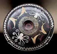 Octopus and dolphin motifs on a ceramic phiale (510–500 BC, from Eretria, Euboea)