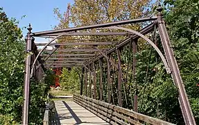 Bridge on the Works site, crossing French Creek (once carrying a spur from the Pickering Valley Railroad), constructed with Phoenix columns.40°08′08.4″N 75°31′03″W﻿ / ﻿40.135667°N 75.51750°W﻿ / 40.135667; -75.51750﻿ (Phoenix Column Truss Bridge)