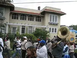 A second line parade on Fontainebleau Drive