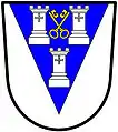 a pile—Argent, on a pile azure three towers, two and one, of the first, in the middle chief point two keys in saltire, wards upwards and inwards, or—Otley Urban District Council, England