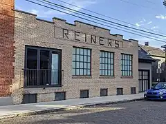 Reiner's facade still extant on Hoster Street