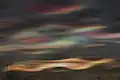 Polar stratospheric clouds displaying a Nacreous iridescence