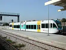 A Athens Suburban Railway DMU at the station in 2005, before electrification in 2017.