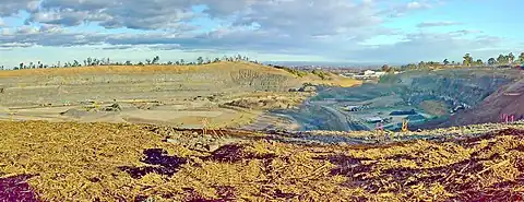 Blast hole drilling in a dolerite quarry at Prospect Hill, Sydney, Australia