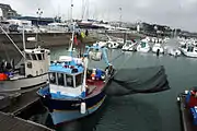 Fishing boat with a winch-operated lift net in Quiberon, France