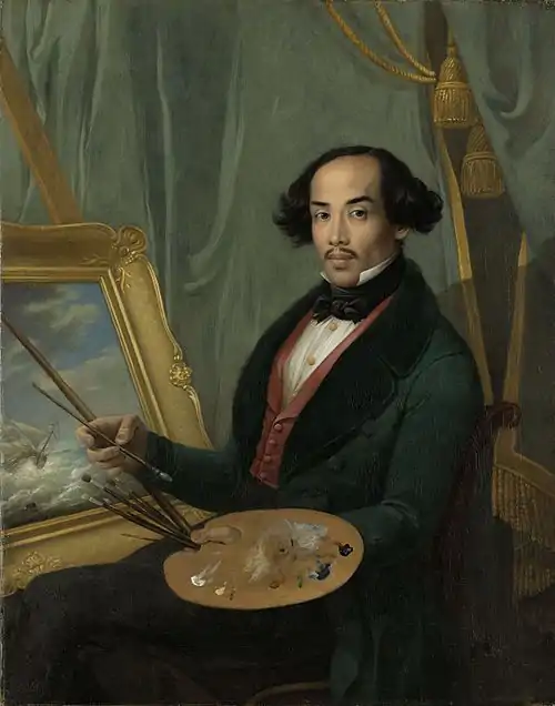 Image 11Raden SalehPainting: Friedrich Carl Albert SchreuelRaden Saleh (1811–1880) was a Romantic painter of Arab-Javanese ethnicity from the Dutch East Indies (now Indonesia). Born in Semarang, in 1829 he was sent to the Netherlands to study portraiture and landscape painting under artists such as Cornelis Kruseman and Andreas Schelfhout. Upon returning to Java in 1851, Saleh focused predominantly on the day-to-day lives of the Javanese, although he also completed his magnum opus, The Arrest of Pangeran Diponegoro, in this period.This painting, though long thought to be a self-portrait, is now attributed to Friedrich Carl Albert Schreuel, a German artist whom Saleh knew during his time in Europe.More selected pictures