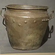 Bronze urn with sun-bird-ship motifs, Romania