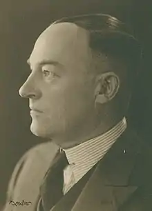 Man's face in profile, facing left