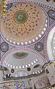 The mosque's central dome and semi-domes