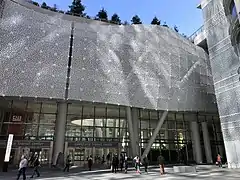 Salesforce Transit Center in San Francisco.  The outer "skin", made of white aluminum, is perforated in the pattern of a Penrose tiling.