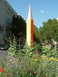 Rainbow Column at Nollendorfplatz by Salomé, erected by the AHA [de; es; ru] (2000)