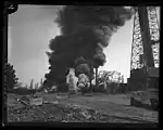 Two wells on fire, Santa Fe Springs, California, 1928