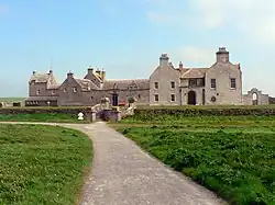 Scottish manor house with harling & crow-stepped gables