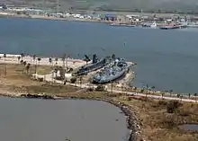 Tautog's preserved sail has tipped over in this view of damage at Galveston Naval Museum, in Seawolf Park