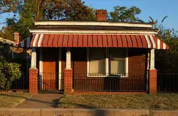 A shotgun-style house in Shed Town.