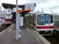 A 2000 series EMU (right)