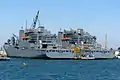 USNS Amelia Earhart(T-AKE-6) dockside beside USNS Robert E. Peary(T-AKE-5)