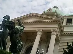 Portico and horse statue, photographed from below