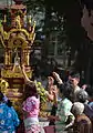 Sprinking water onto Buddha relics during the Songkran Festival in Thailand