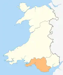 A map of Wales in yellow with an area in green (about 10%) at the top (north)