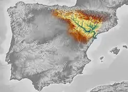 Black and white satellite image of the Iberian Peninsula, but the Ebro River valley at the Spain/France border uses red to blue colours to indicate topography and elevation