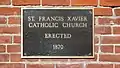 Dedication plaque of St. Francis Xavier Church.