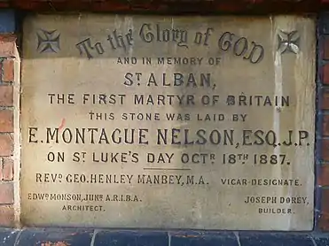 Dedication stone to Saint Alban the martyr, laid by E. Montague Nelson, J.P., on 18 October 1887. It records that Rev. George Henley Manbey was the vicar-designate, that Edward Monson, Jr. was the architect, and that Joseph Dorey was the builder.