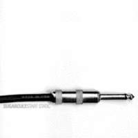 A guitar cable jack plug against a white backdrop