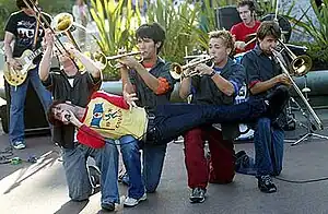 Suburban Legends in 2002.(Left to right: Brian Klemm, Brian Robertson, Vince Walker, Aaron Bertram, Derek Rock, Dallas Cook. Across: Tim Maurer. Not pictured: Chris Maurer.)