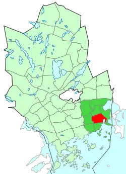 Location of Tapiola (red) within Espoo (light green) and Suur-Tapiola (dark green)