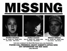 A black and white missing person poster, with the text "MISSING" in upper-case bold typeface, placed atop the images of three young Caucasian individuals. The photo on the left shows a woman in her early 20s; the middle shows a bearded man in his mid-20s, wearing a cap which obscured half of his face from sunlight; and the right shows a man also in his mid-20s, wearing an army hat. Below each of the photos contain their personal information such as age, height, and weight. The bottom of the poster contains a message appealing to contact authorities, followed by an emergency hotline.