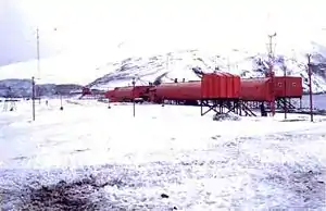 The Argentine station Corbeta Uruguay in 1981.  It consists of a number of red buildings fixed on stilts and numerous aerials scattered around