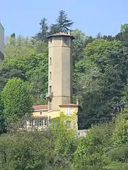 Tower building on the side of the Saône river