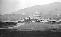 The company town with its hotel, restaurant, bar, houses, and cement processing plant c. the 1920s