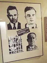 Poster of John Dillinger and two gang members in the hotel hallway