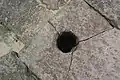 Holes where molten iron was introduced