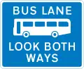 Bus lane with traffic proceeding from both ways (reminder for pedestrians)