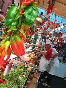 Street vendors selling sausages at the feast