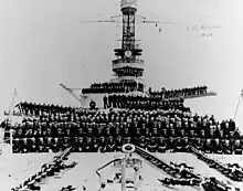 Hyperboloid mast towers were on the USS Arizona, with the ship's complement posing on her forecastle, forward turrets and superstructure, circa 1924.