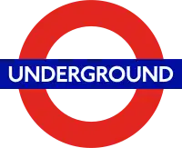 The word "UNDERGROUND" in white letters superimposed on a blue rectangle superimposed on the red circumference of a circle on a clear background