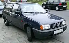  Front-three quarter view of a small three-door car with flush headlamps.